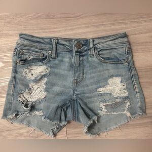 Distressed American Eagle Light Blue Denim Shorts with floral lace pockets